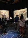 Visitors View Ceiling Fresco Paintings in Sistine Chapel by Michelangelo in Auckland New Zealand