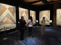Visitors View Ceiling Fresco Paintings in Sistine Chapel by Michelangelo in Auckland New Zealand