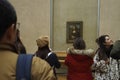 Visitors view and photograph the Mona Lisa Royalty Free Stock Photo