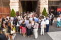 Visitors wait outside the arena di