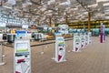 Visitors walk around Departure Hall in Changi Airport Singapore Royalty Free Stock Photo