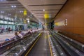 Visitors walk around Departure Hall in Changi Airport Singapore Royalty Free Stock Photo