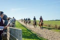 Visitors watching the horses at Richard Bandy Racing, Kingsclere