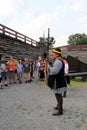 Visitors watching reenactment of soldier loading musket for demonstration,Fort William Henry,New York,2016