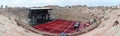 Visitors watching workers who are preparing Arena di Verona