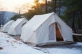 Visitors winter haven White camping tents at a mountain resort