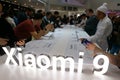 Visitors at the Xiaomi company booth at the Mobile World Congress 2019 in Barcelona