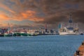 Various green-hulled ships and oil rig moored at the Trawlerkade at IJmuiden Royalty Free Stock Photo