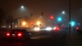 VISTA, CALIFORNIA USA - 24 JAN 2020: Marine layer, dense fog on driveway crossroad at night. June gloom, misty nebulous bad Royalty Free Stock Photo