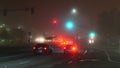 VISTA, CALIFORNIA USA - 24 JAN 2020: Marine layer, dense fog on driveway crossroad at night. June gloom, misty nebulous bad Royalty Free Stock Photo