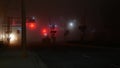 VISTA, CALIFORNIA USA - 24 JAN 2020: Marine layer, dense fog on driveway crossroad at night. June gloom, misty nebulous bad Royalty Free Stock Photo