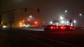 VISTA, CALIFORNIA USA - 24 JAN 2020: Marine layer, dense fog on driveway crossroad at night. June gloom, misty nebulous bad Royalty Free Stock Photo