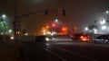 VISTA, CALIFORNIA USA - 24 JAN 2020: Marine layer, dense fog on driveway crossroad at night. June gloom, misty nebulous bad Royalty Free Stock Photo