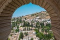 Vista de la ciudad de Granada atravÃÆÃÂ©s del arco de una ventana e Royalty Free Stock Photo