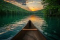 Visual featuring canoe on tranquil waters at blue ridge lake with sunset backdrop. Royalty Free Stock Photo