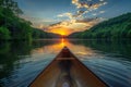 Visual featuring canoe on tranquil waters at blue ridge lake with sunset backdrop. Royalty Free Stock Photo