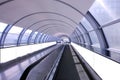 Visual mockup for advertising banner display on moving walkway travelator in long pedestrain tunnel. Blank billboard advertising Royalty Free Stock Photo