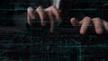 Hands typing on a keyboard with glowing programming code and data streams surrounding the image, symbolizing coding Royalty Free Stock Photo