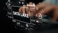 Visual Representation of Data Lake Concept with User Hands Engaging with Digital Interface and Graphs. Asymptotic smart Royalty Free Stock Photo