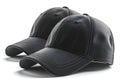 Visual of three black baseball caps isolated on white background, different angles, hyper realistic Royalty Free Stock Photo