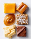 Assorted caramel candies arranged artistically on a light surface, showcasing various textures and colors, perfect for Royalty Free Stock Photo