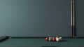 A Close-Up View of a Pool Table with Colorful Balls Arranged in a Triangle Against a Dark Green Wall and Two Pool Cues in the Royalty Free Stock Photo