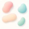 Four soft pastel colored bean shaped objects arranged on a clean white background with subtle shadows Royalty Free Stock Photo