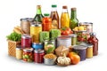Still Life Arrangement of Canned Foods Bottles Vegetables and Garlic on White Background Royalty Free Stock Photo