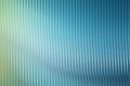 Abstract textured background with vertical ribbed pattern in shades of blue and green, creating a sense of depth and fluidity Royalty Free Stock Photo