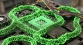 Futuristic circuit board with glowing green data streams and CPU Royalty Free Stock Photo