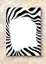 Black and white zebra stripes creating a dynamic frame on a textured wall Royalty Free Stock Photo