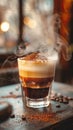 A visually striking, multi-layered coffee beverage captured in a warm, atmospheric setting. The distinct layers include dark Royalty Free Stock Photo