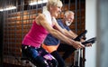 Vital mature couple exercising in the gym. Royalty Free Stock Photo