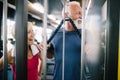 Vital mature couple exercising in the gym. Royalty Free Stock Photo