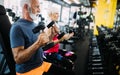 Vital mature couple exercising in the gym. Royalty Free Stock Photo