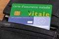 Vitale card and European health insurance card in a wallet close up