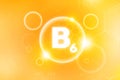 Vitamin B-6 orange glowing background with bubbles. Healthy vitamin concept design with glowing shapes and text Royalty Free Stock Photo
