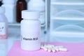Vitamin B10 pills in a bottle, food supplement for health