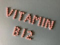 Vitamin B12, word in pills, banner heading Royalty Free Stock Photo