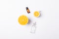 Vitamin C in cosmetics concept of bottles of serum and extract