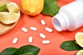 Vitamin C nutrition pills, Natural medicine supplement from organic fresh fruit and vegetable Royalty Free Stock Photo