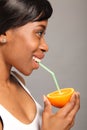 Vitamin C orange fruit drink for black woman