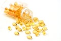 Vitamin capsules with E poured out of bottle Royalty Free Stock Photo