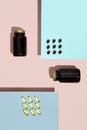 Vitamin capsules. lecithin pills and omega 3 pill in glass bottle on pink and blue background.trendy shadows. Concept