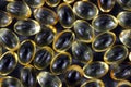 Vitamin D-3 capsules on a black background Royalty Free Stock Photo