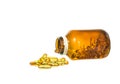 Vitamin D bottle with spilled contents isolated Royalty Free Stock Photo