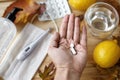 Vitamin D, vitamin C and zinc pills in senior hand, Boost immune system in autumn flu or covid Royalty Free Stock Photo