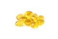 Vitamin D. Omega 3. Yellow pills slide isolated on white background. Vitamins are antibiotics. Cure for diseases.