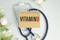 Vitamin D word on notebook,stethoscope Royalty Free Stock Photo