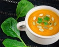 Vitamin fresh pumpkin puree soup with white seeds Royalty Free Stock Photo